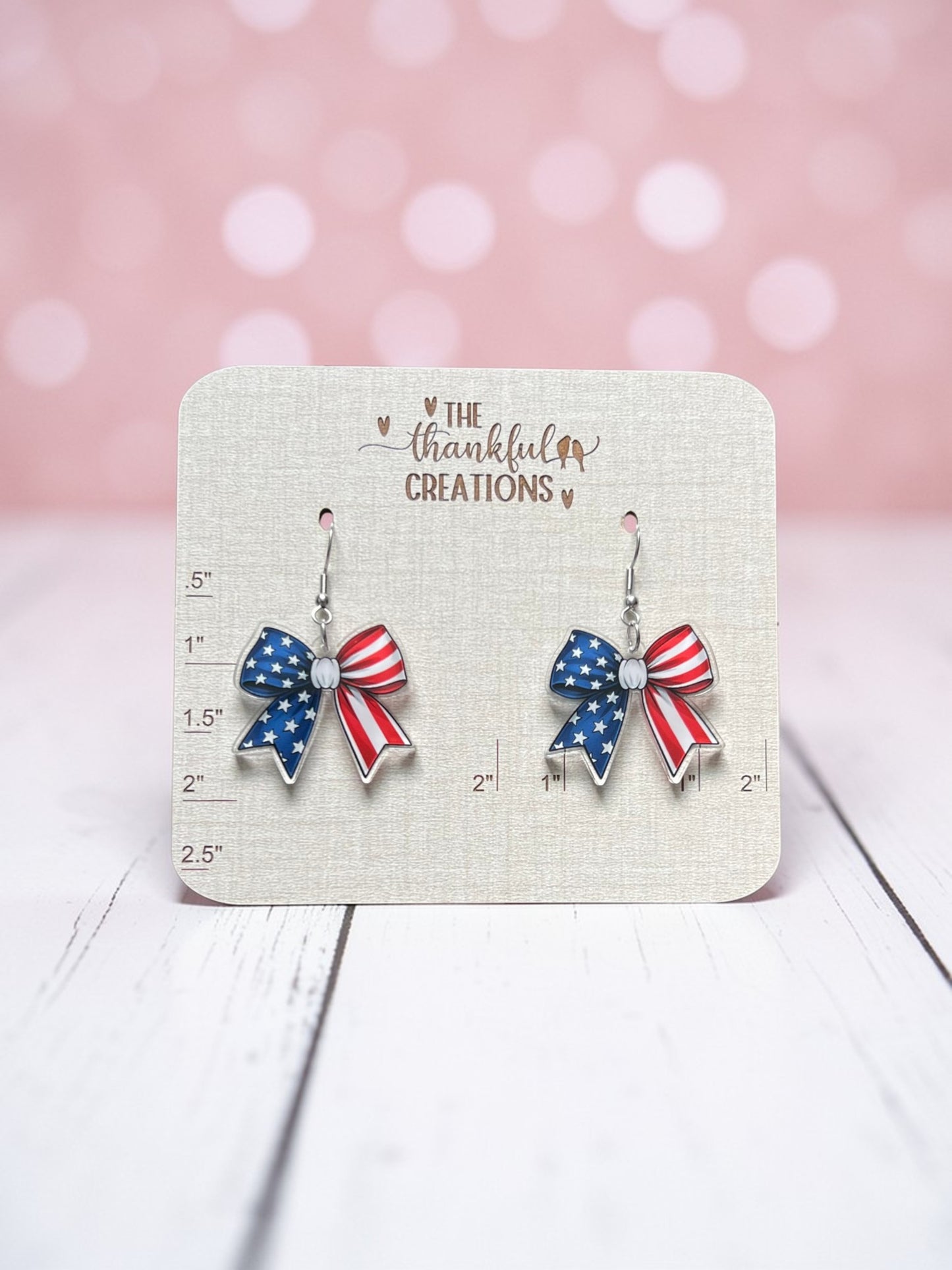Handmade patriotic bow earrings with stars and stripes American flag design stainless steel hooks