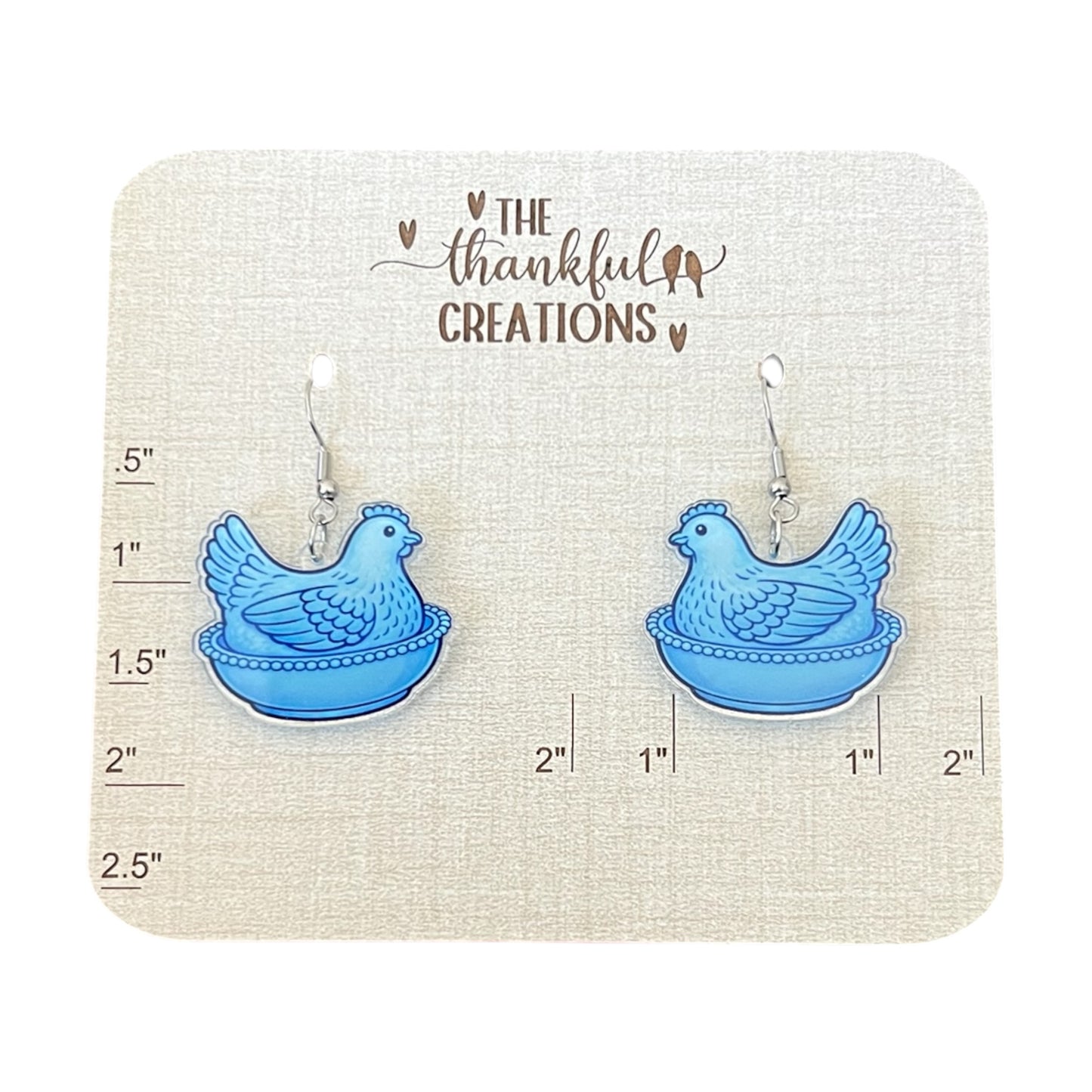 Vintage hen on nest chicken earrings in multiple colors displayed on farmhouse style cards