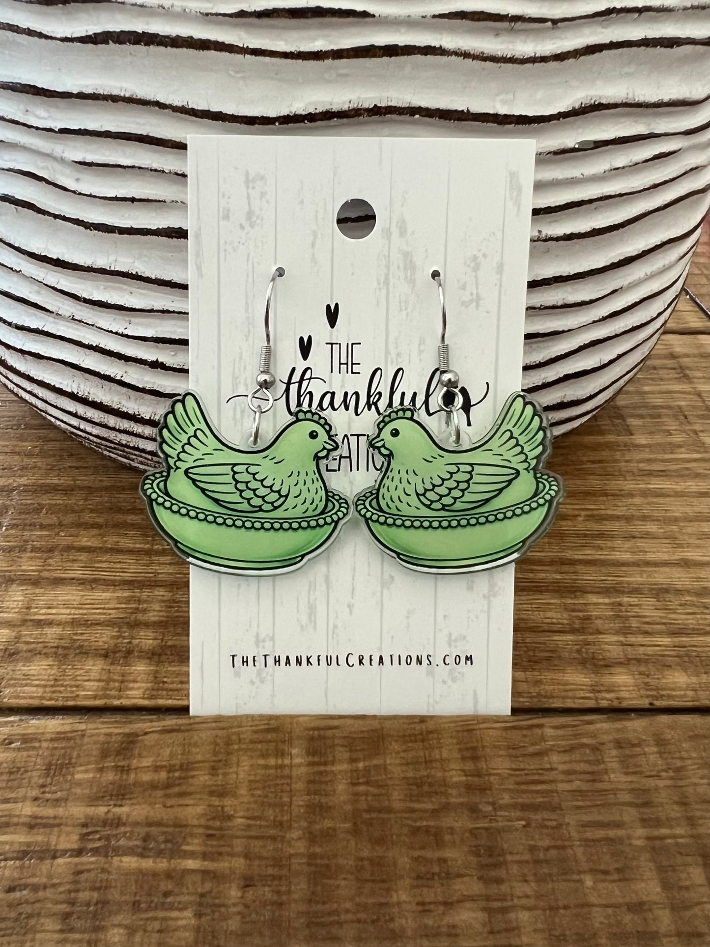 Vintage hen on nest chicken earrings in multiple colors displayed on farmhouse style cards