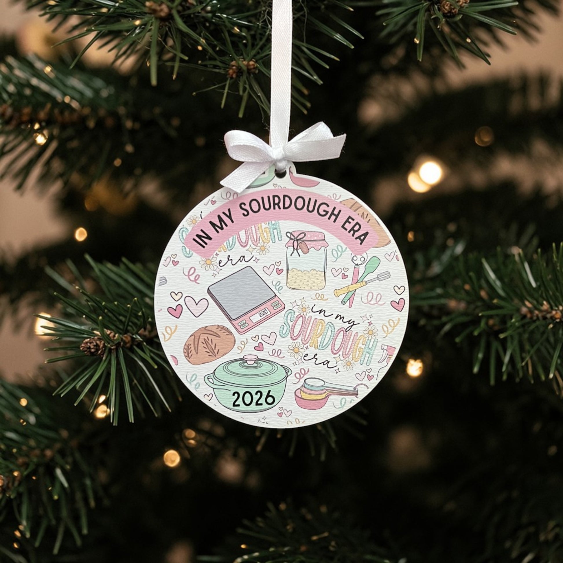 Sourdough ornament hanging on Christmas tree, cozy baking kitchen decor, cottagecore holiday aesthetic