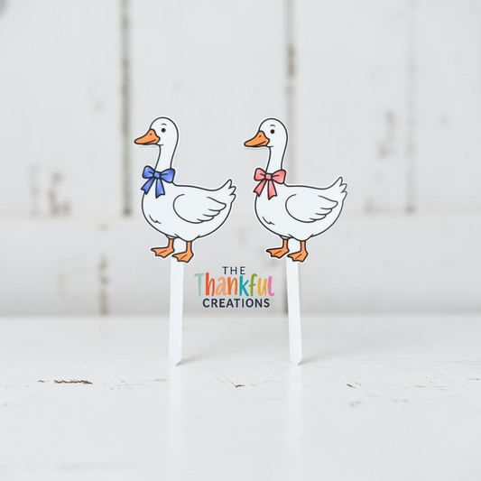 Cute goose with bow plant stake inspired by vintage concrete porch geese, featuring cottagecore, grandmacore, farmhouse, and whimsical garden decor aesthetics for indoor plants and flower pots.
